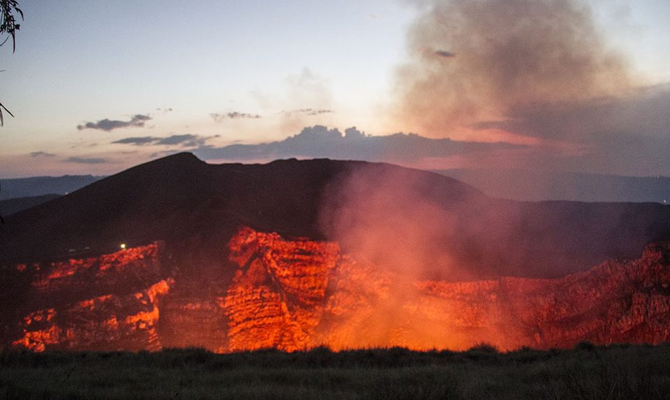 The glowing lava crater of Masaya volcano at dusk, Nicaragua — a day trip from San Juan del Sur